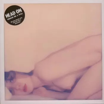 Head On: Woman On A Wall