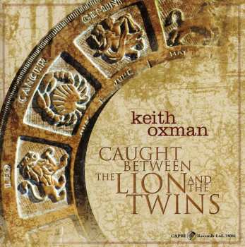 Album Keith Oxman: Caught Between The Lion And The Twins