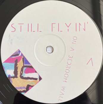 LP Still Flyin': On A Bedroom Wall