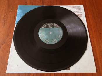 LP The Ghost And The Machine: Red Rain Tires