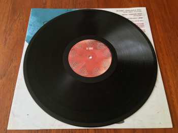 LP The Ghost And The Machine: Red Rain Tires